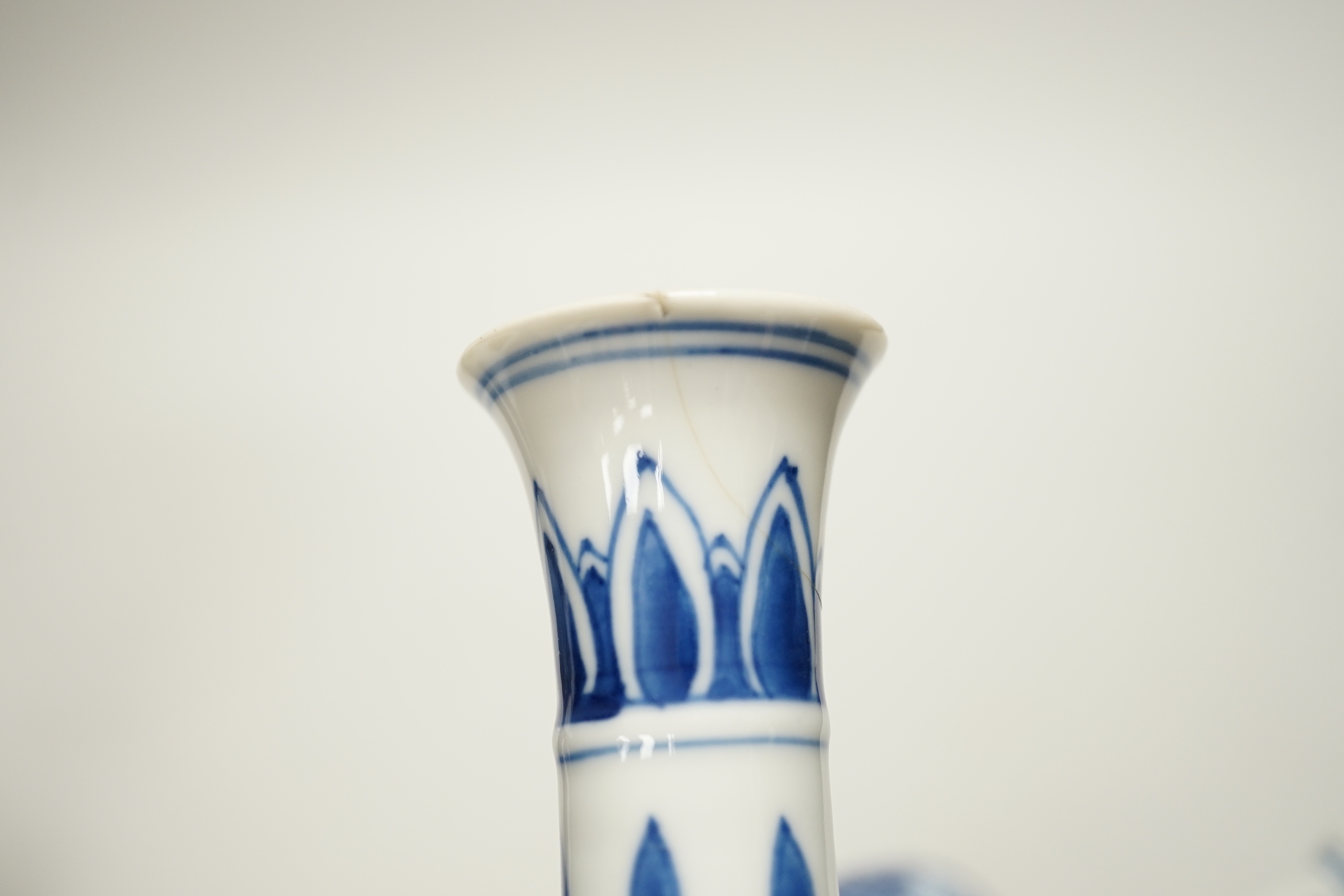 Four Chinese Kangxi period blue and white small vases, tallest 16cm high